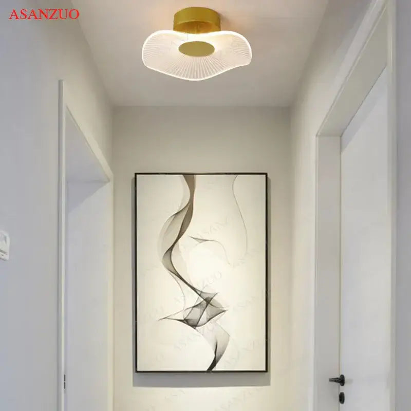 Nordic gold lotus leaf ceiling light for bedroom with radial pattern