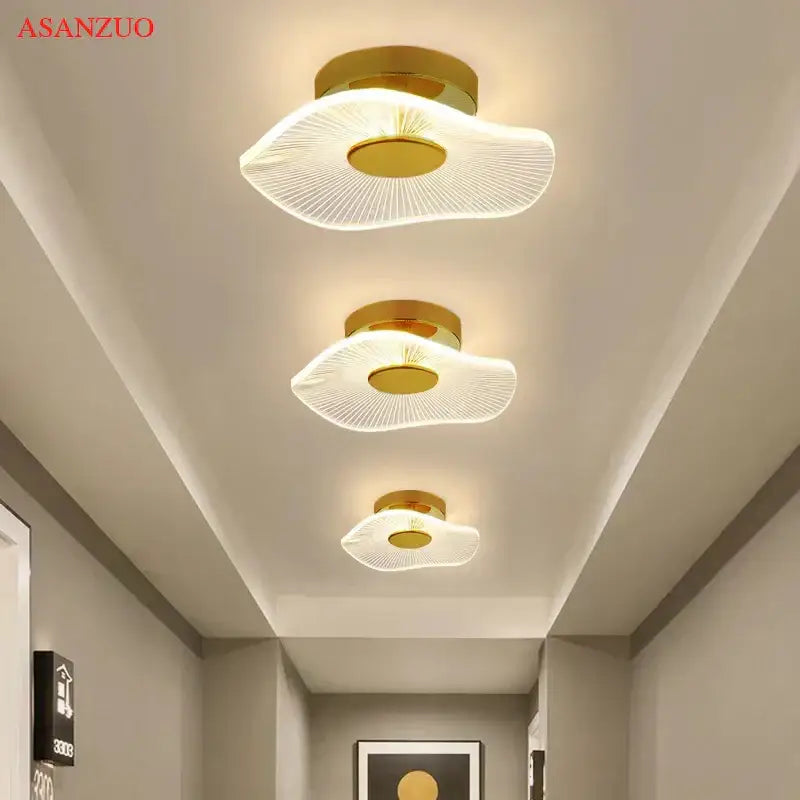 Nordic gold lotus leaf ceiling light for bedroom with radial pattern