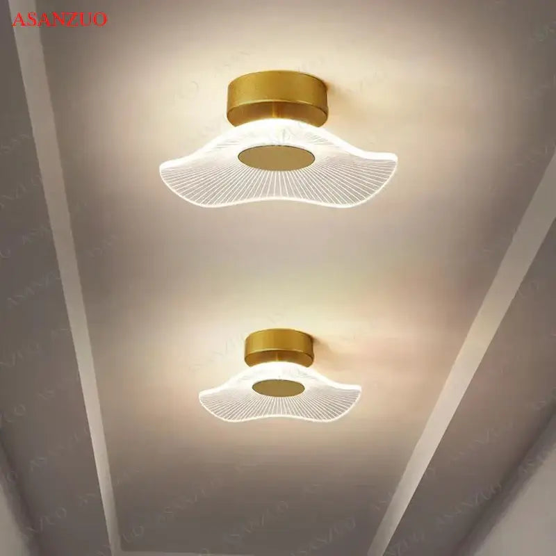 Nordic gold lotus leaf ceiling light for bedroom with radial pattern