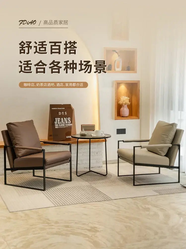 Modern brown leather lounge chair reception area black metal frame
