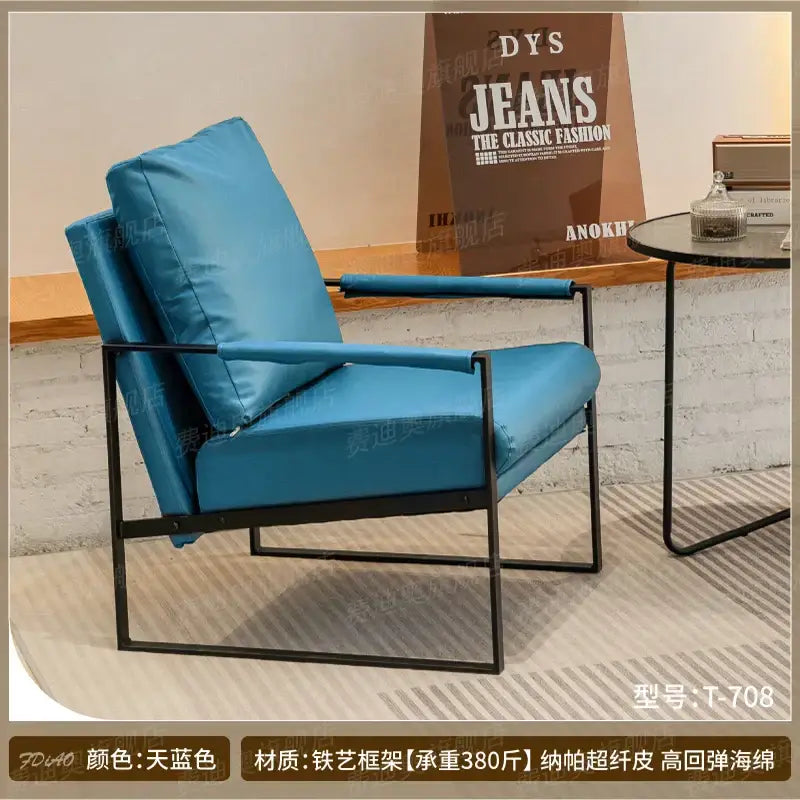 Modern brown leather lounge chair reception area black metal frame