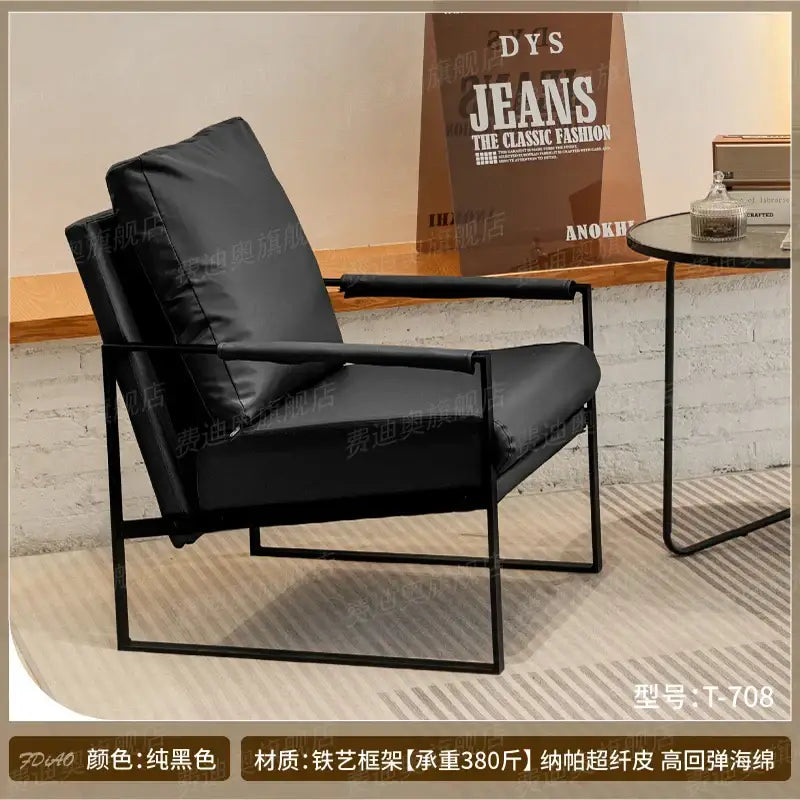 Modern brown leather lounge chair reception area black metal frame