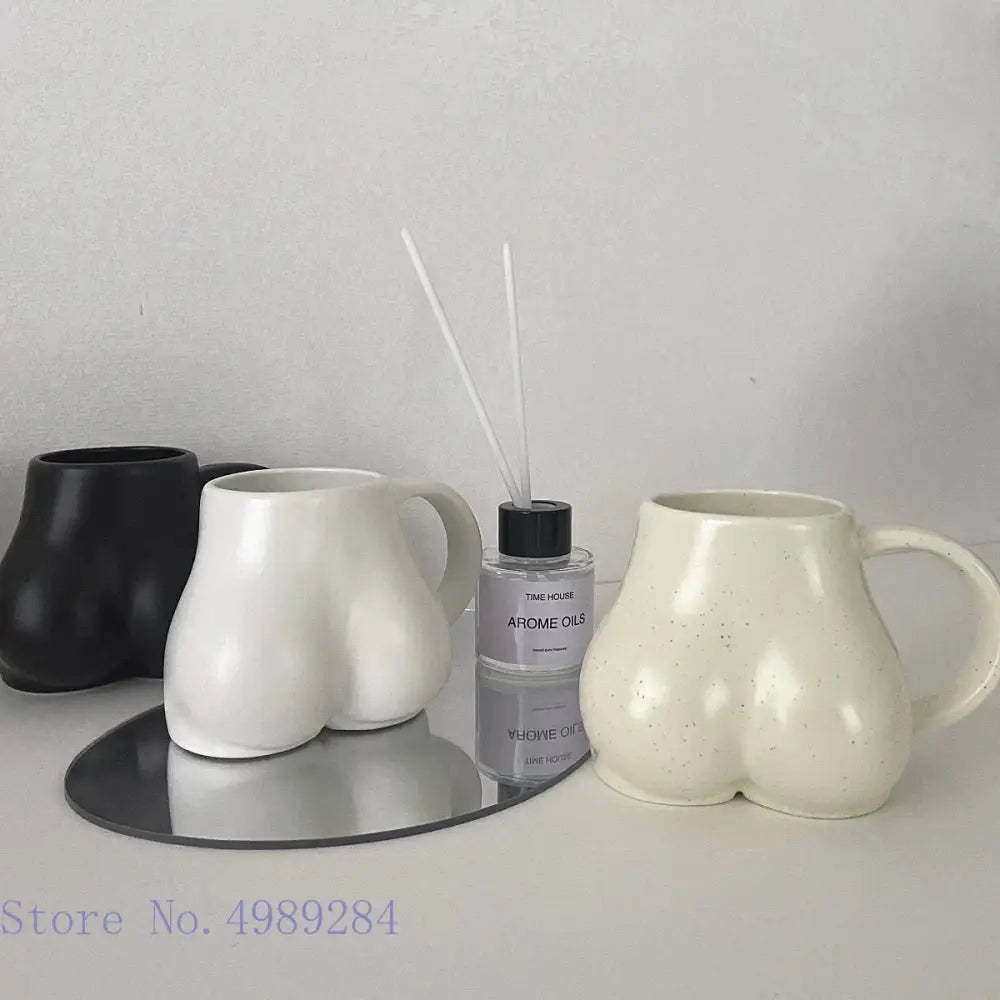 Playful white speckled butt shape ceramic coffee cup kitchen decor