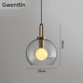 Luxe glass ball pendant lights brass and frosted glass dining room