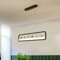 Modern black metal led hanging light with succulents for dining room