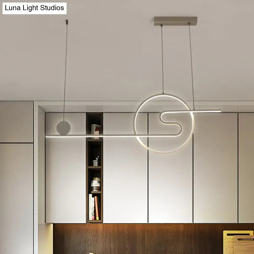 Modern minimalist sun and cloud island light black white gold kitchen