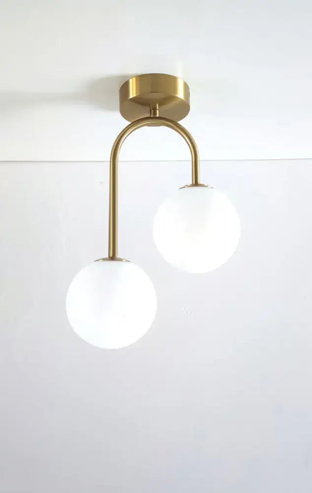 Modern brass ball ceiling light for living room with frosted glass