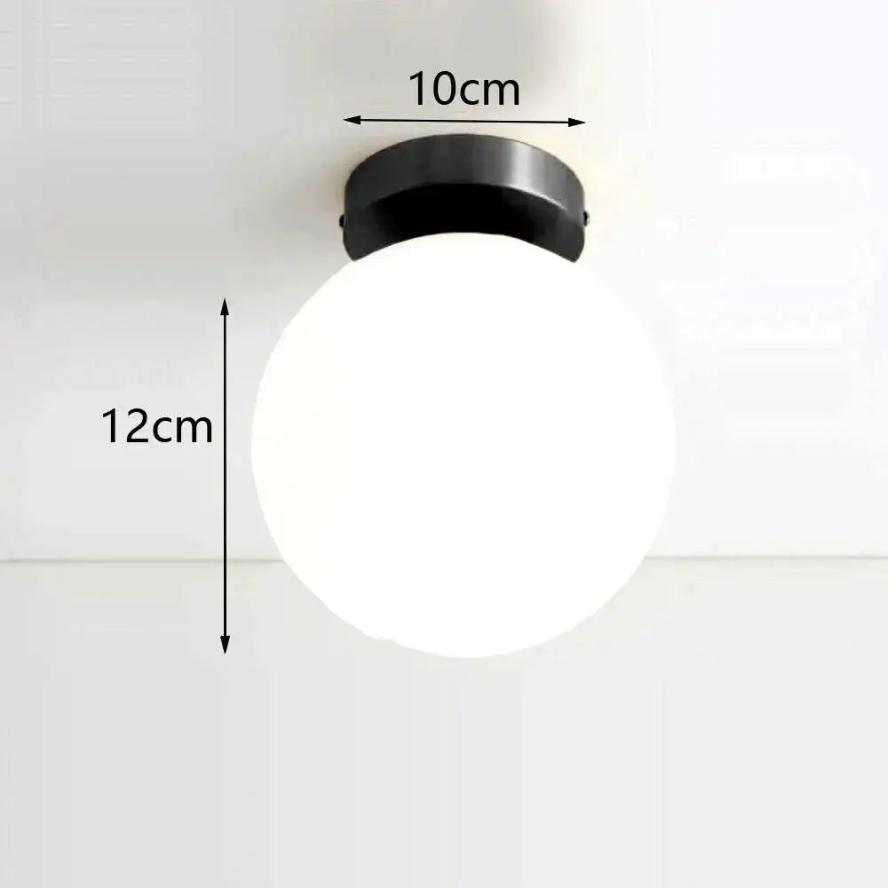 Modern brass ball ceiling light for living room with frosted glass