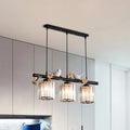 Modern black cylinder island light with birds – kitchen pendant