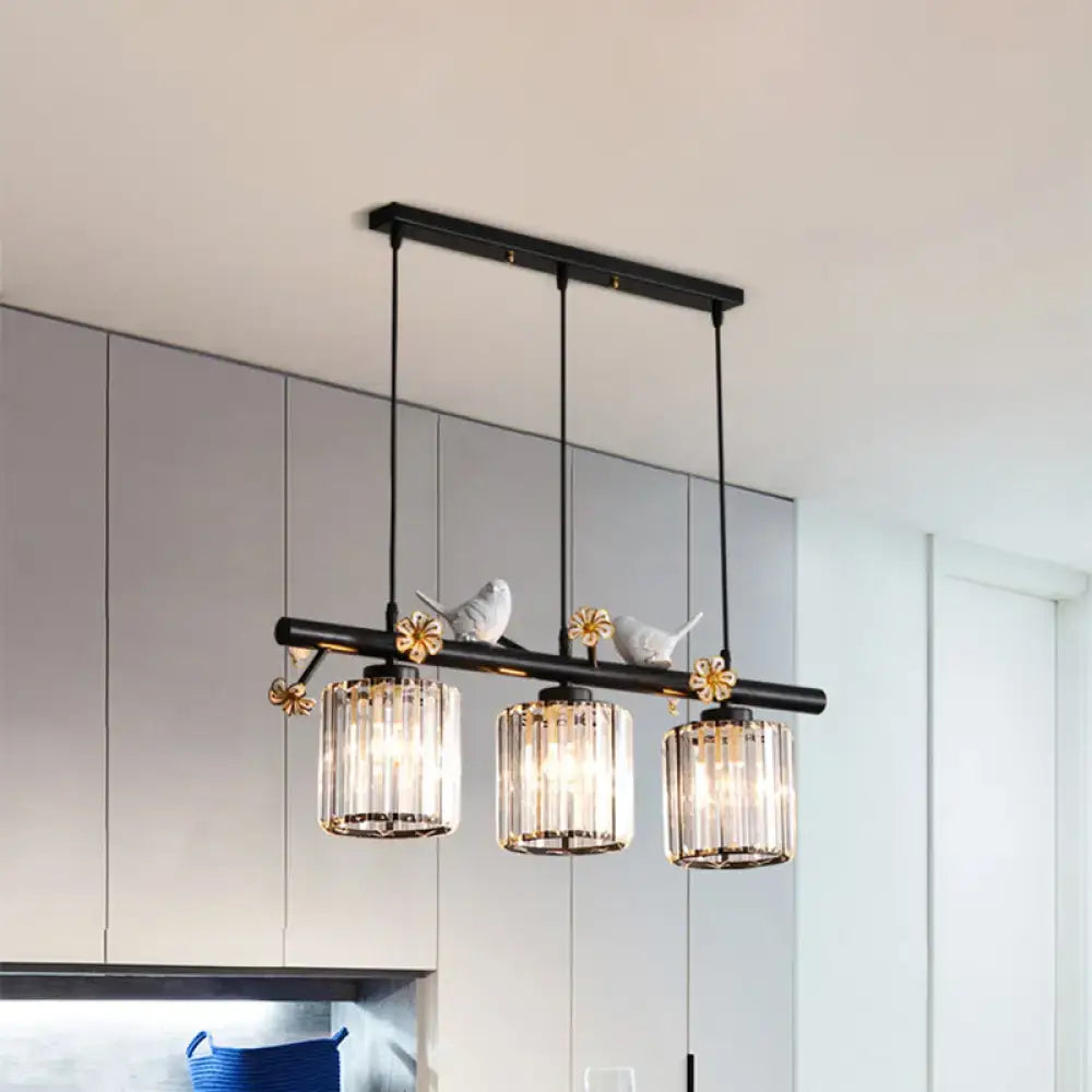 Modern black cylinder island light with birds – kitchen pendant