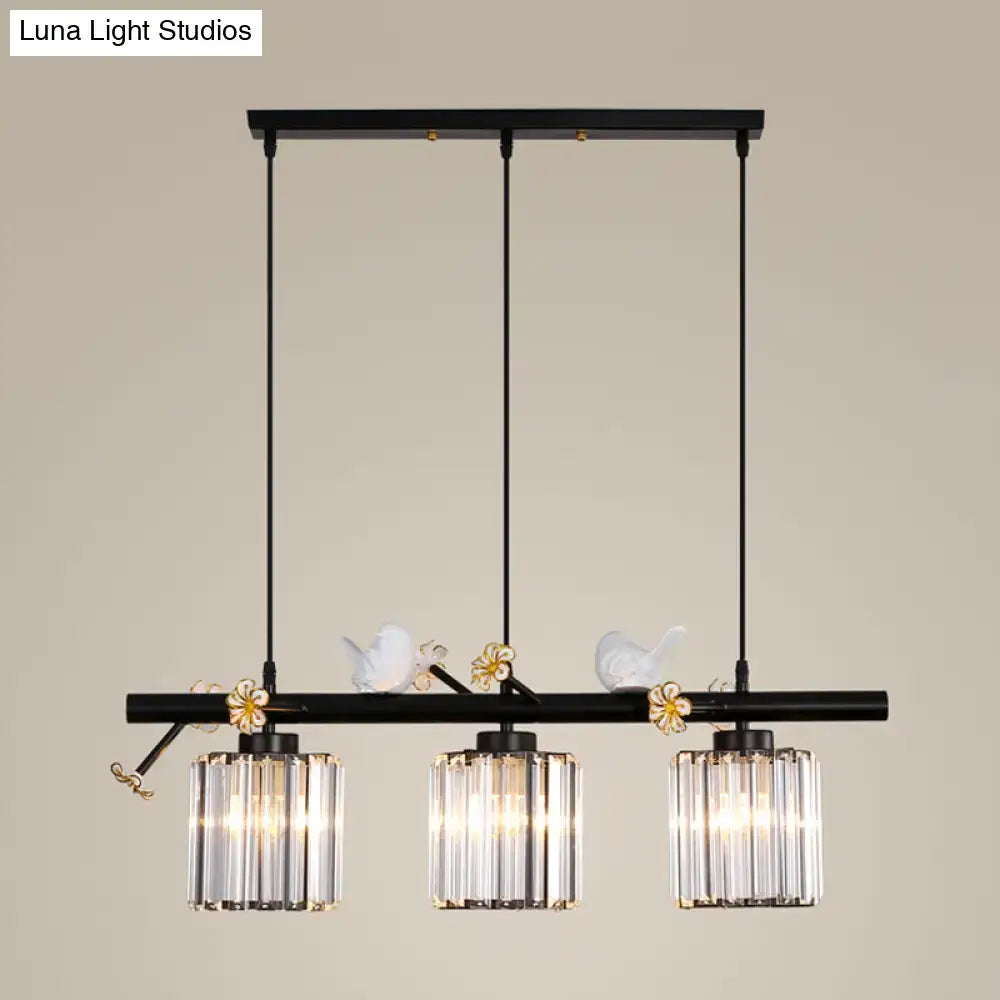 Modern black cylinder island light with birds – kitchen pendant