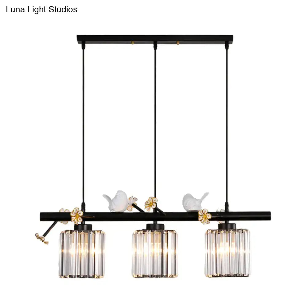 Modern black cylinder island light with birds – kitchen pendant