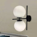 Modern black and white spherical wall light fixture living room