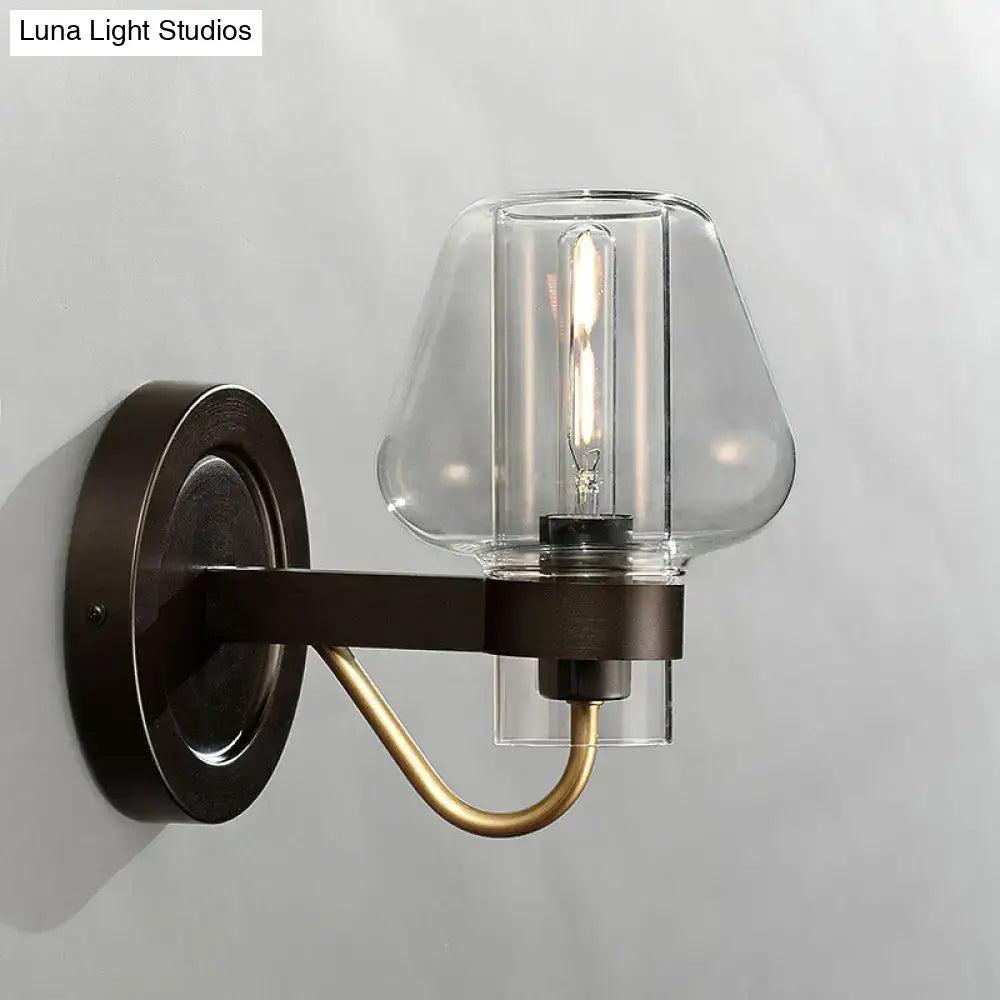 Modern black & brass wall sconce with glass mushroom shade bedroom
