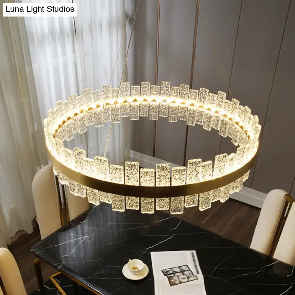 Modern brass plated crystal loop pendant light for dining room