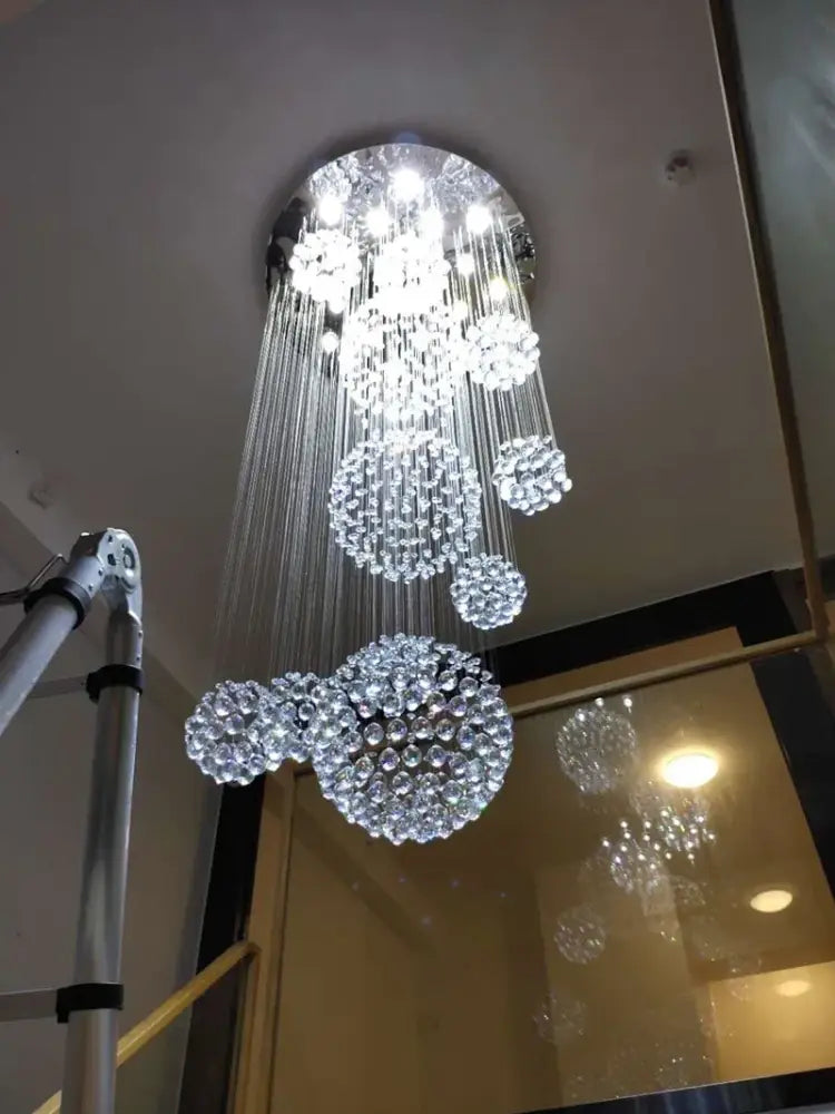 Modern crystal raindrop chandelier for high ceiling living room