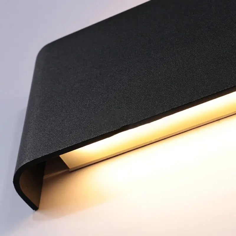 Modern black metal wall sconces – living room ambient lighting