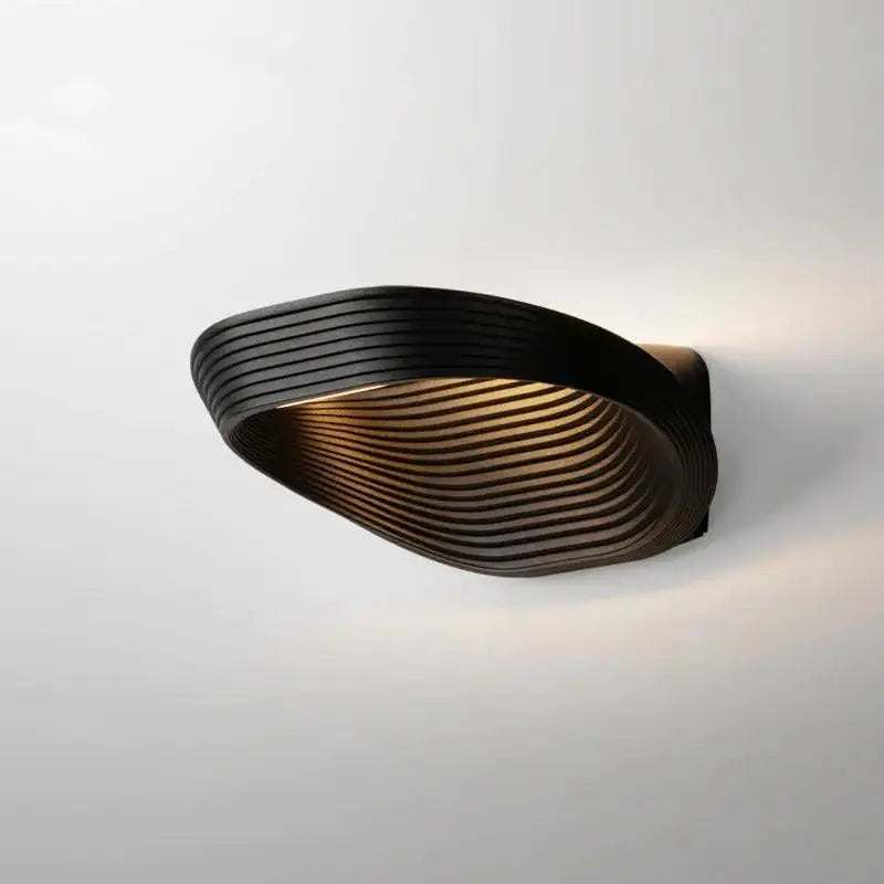 Modern minimalistic wall sconces – living room curved ridged lighting