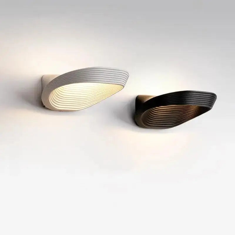 Modern minimalistic wall sconces – living room curved ridged lighting
