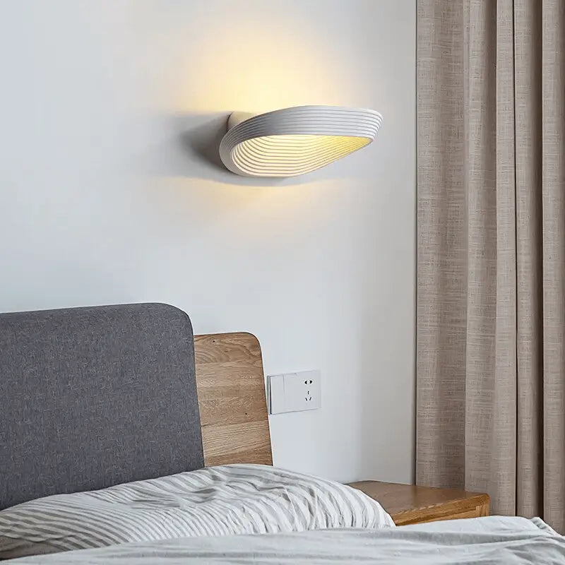 Modern minimalistic wall sconces – living room curved ridged lighting