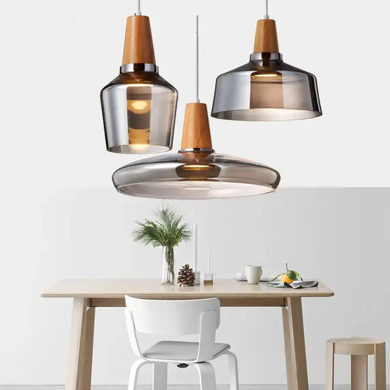 Modern glass light fixtures with wood accents – kitchen pendant set