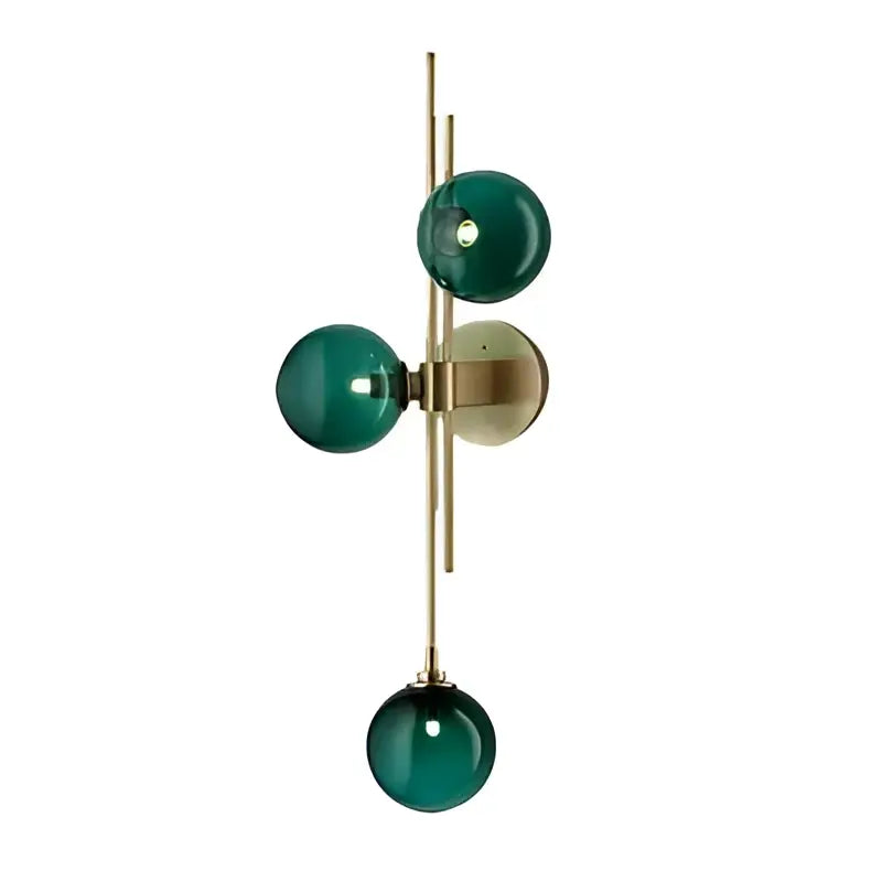 Modern gold wall sconce with textured glass globes for bedroom