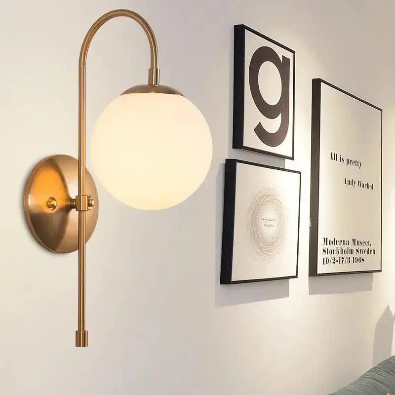 Modern gold wall lamp bedroom frosted globe sconce