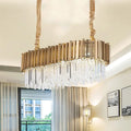 Modern gold oblong island lamp with crystal rods for dining room