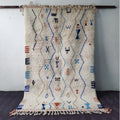 Handmade geometric beige beni ouarain rug bedroom decor