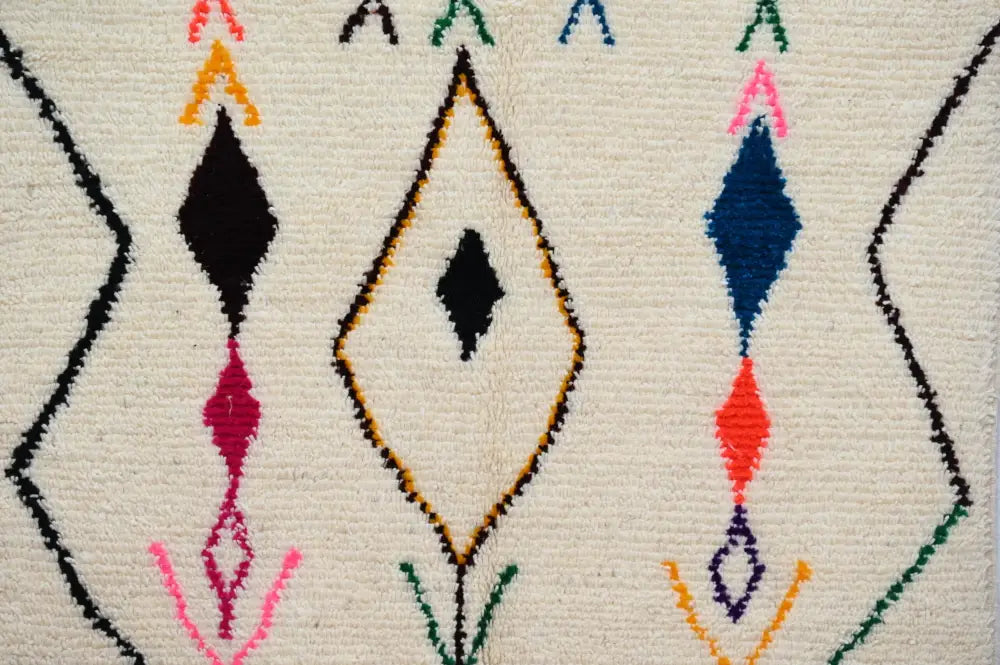 Beige moroccan handmade azilal rug with geometric patterns living room