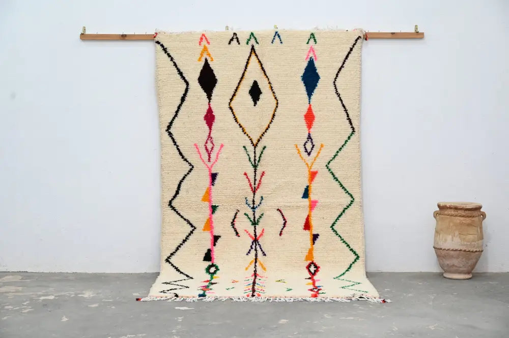 Beige moroccan handmade azilal rug with geometric patterns living room