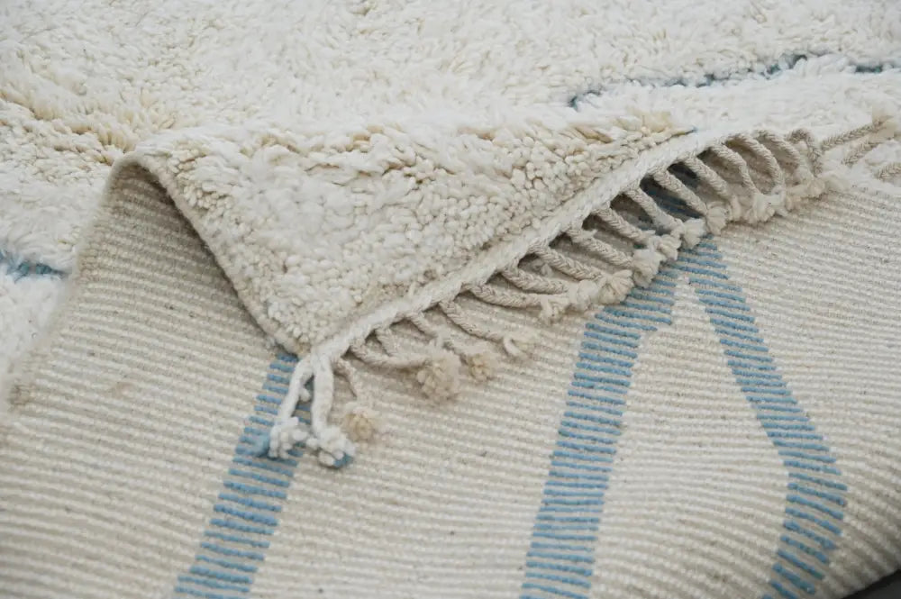 Handmade beni ouarain cream & blue rug bedroom moroccan wool decor