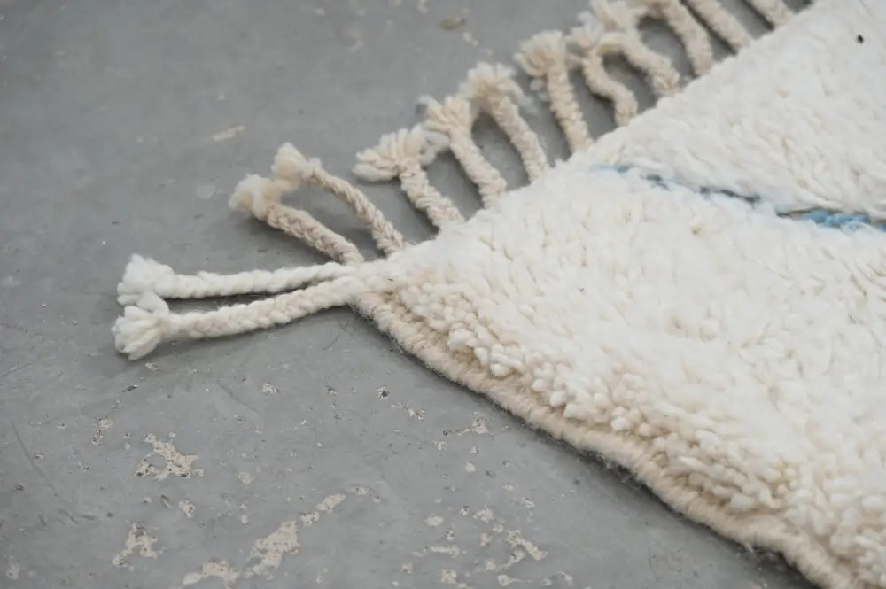 Handmade beni ouarain cream & blue rug bedroom moroccan wool decor