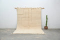 Handmade beige geometric beni ouarain rug bedroom wool decor