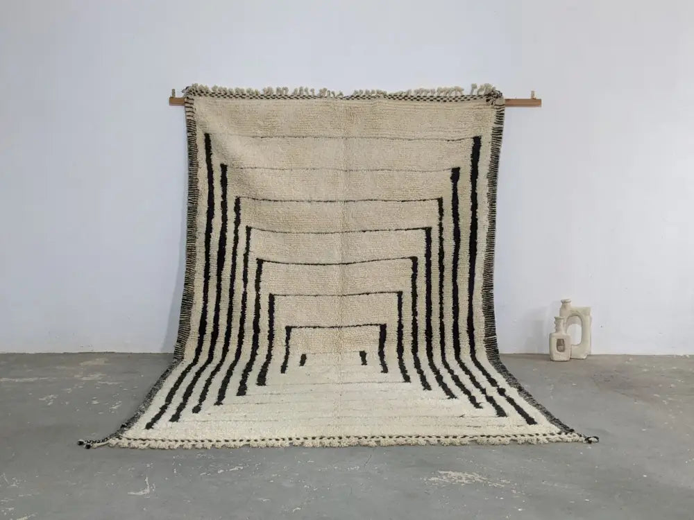 Handmade cream and black beni ouarain rug living room decor