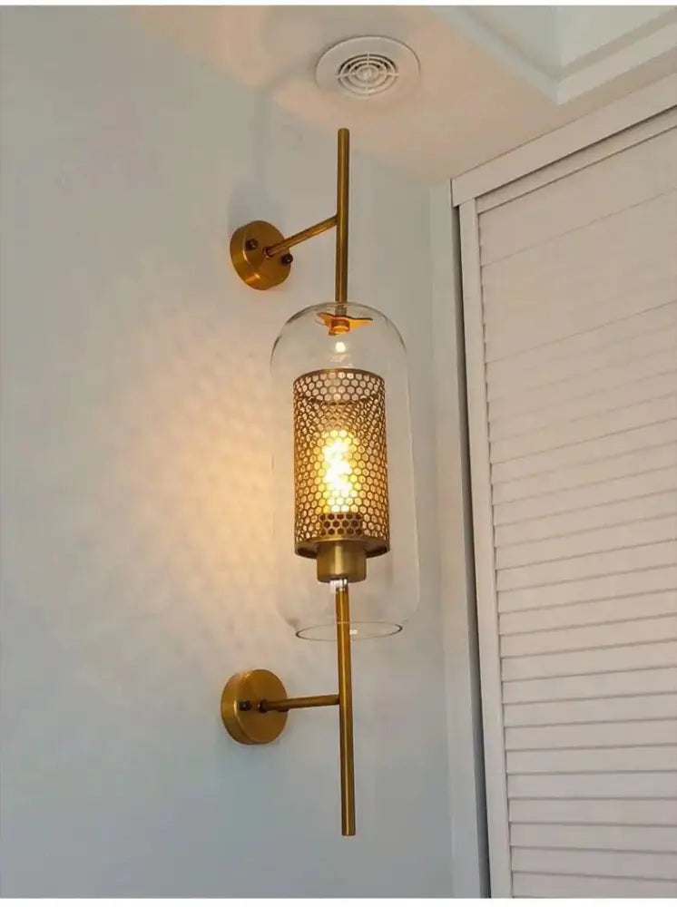Modern moroccan brass and amber glass wall sconce bathroom light
