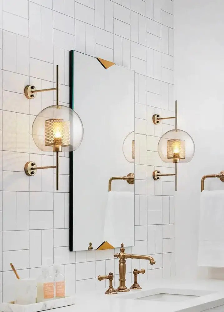 Modern moroccan brass and amber glass wall sconce bathroom light