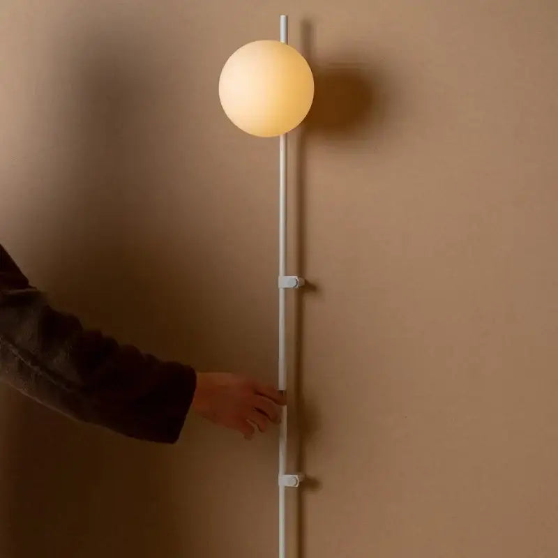 Minimalist white globe plug in wall lamp sconce – bedroom light