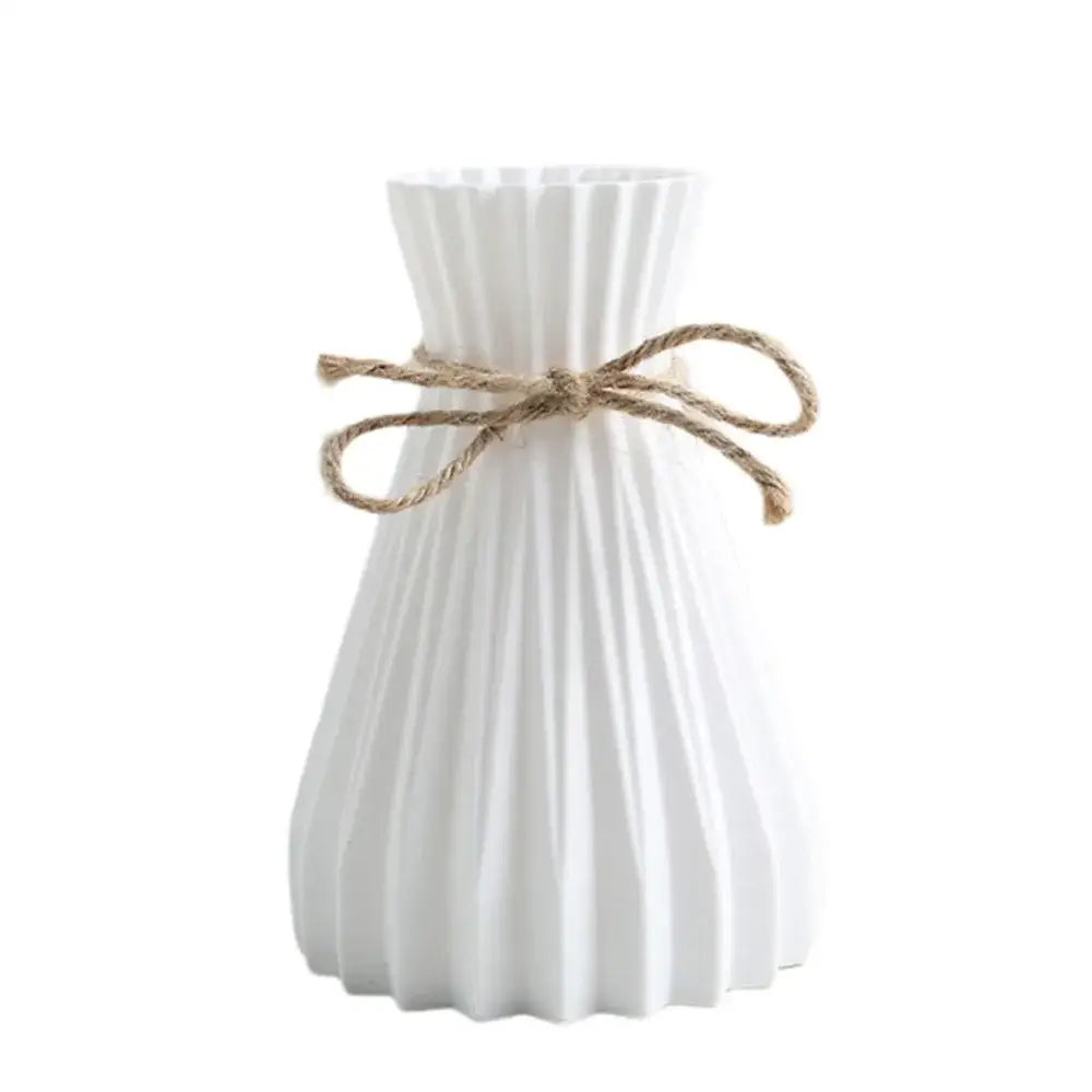 Origami style pink blue and white plastic flower vase living room