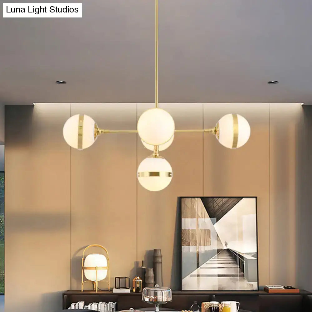 Postmodern gold branch pendant light with white ball glass dining room