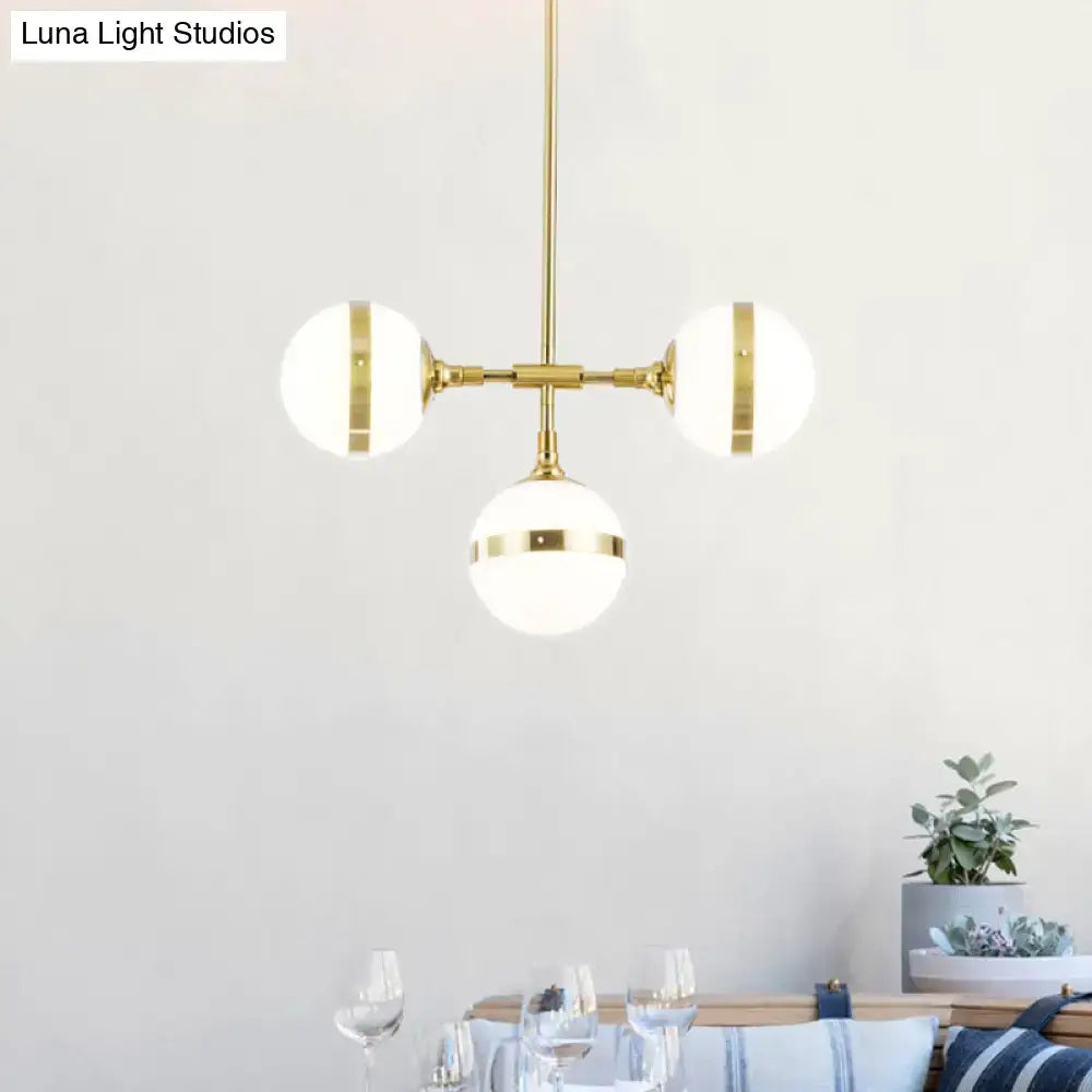 Postmodern gold branch pendant light with white ball glass dining room