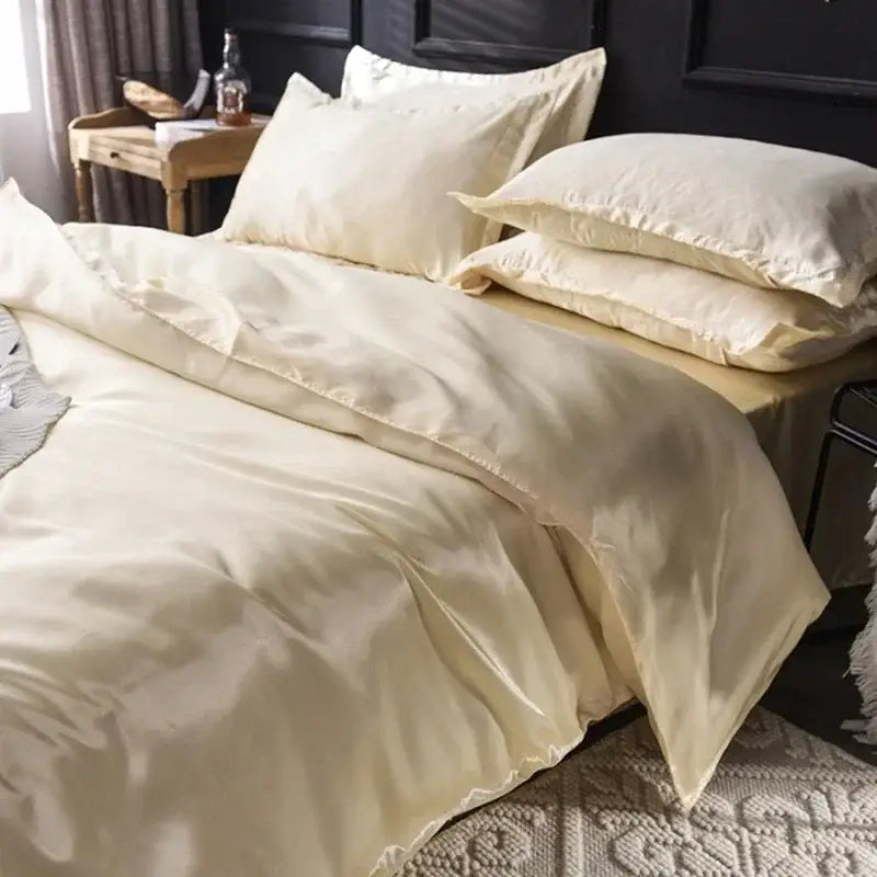 Teal satin bed sheet set with matching pillowcases for bedroom