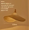 Woven golden brown rattan pendant light with dimmable bamboo shade dining room