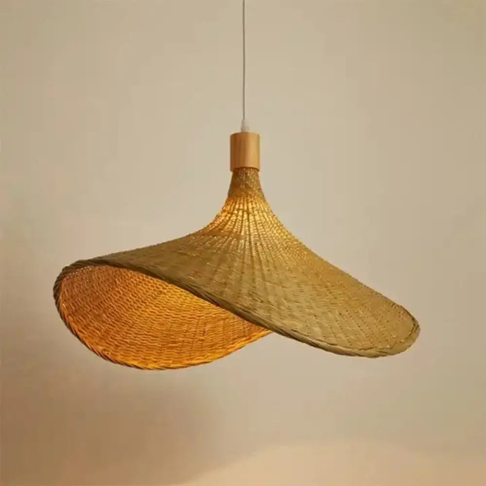 Woven golden brown rattan pendant light with dimmable bamboo shade dining room