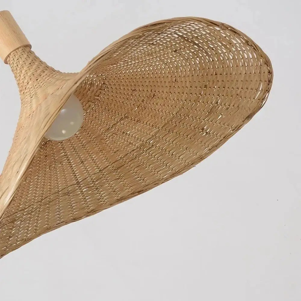 Woven golden brown rattan pendant light with dimmable bamboo shade dining room