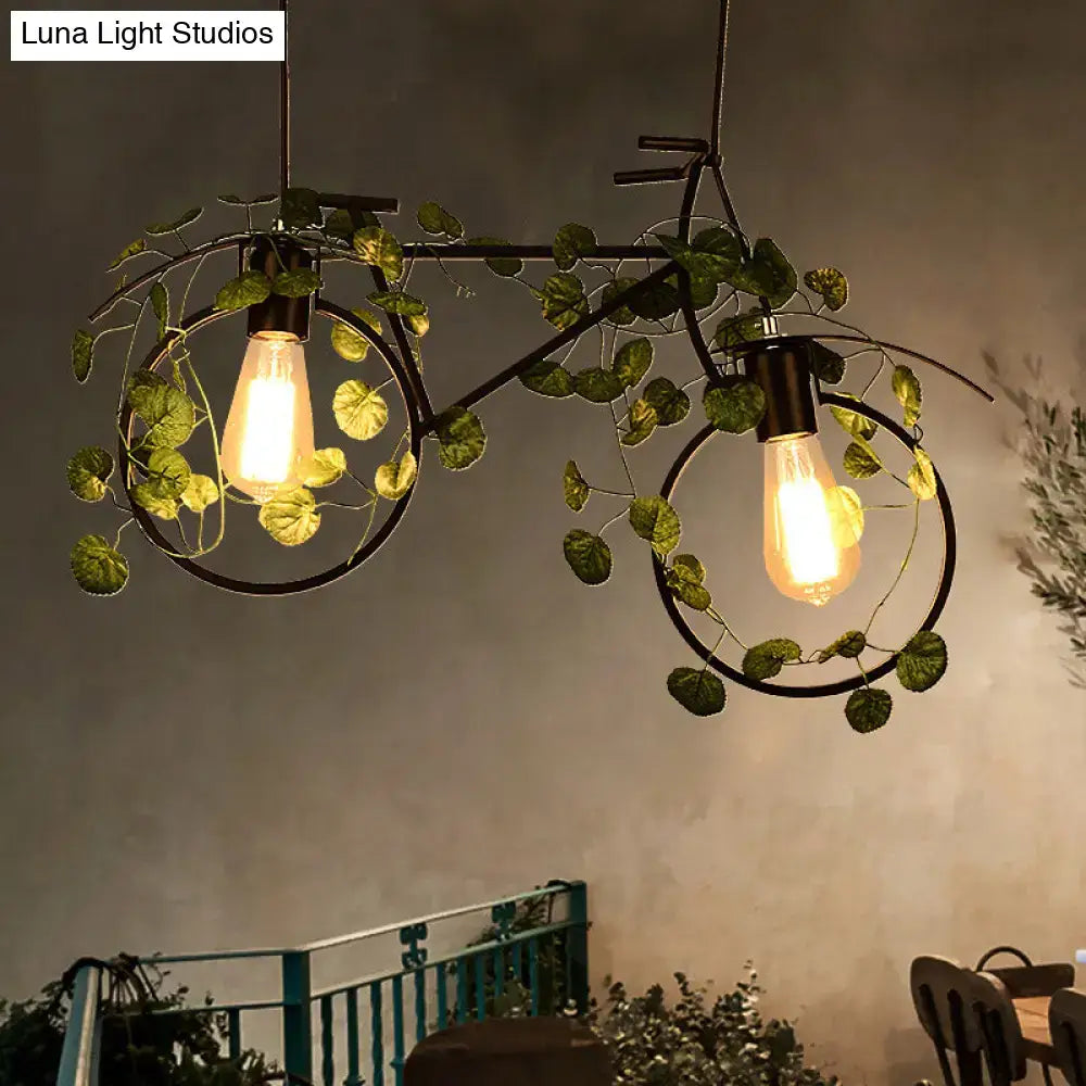 Industrial retro bicycle ceiling light with plant decor dining room
