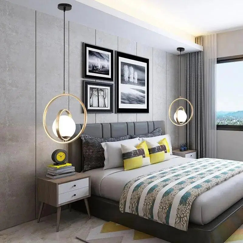 Modern rotating gold ring pendant light bedroom frosted glass globe