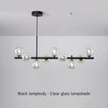 Sleek black metal glass ball chandelier for dining room