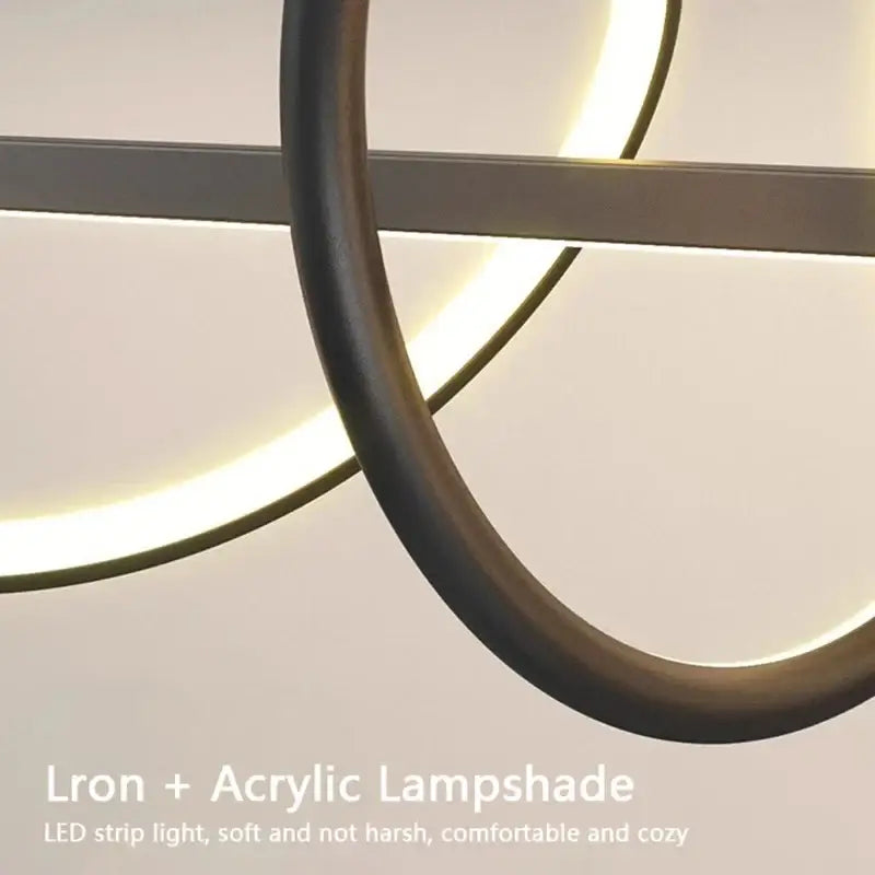 Sleek wavy pendant lights for dining room with brushed metallic finish