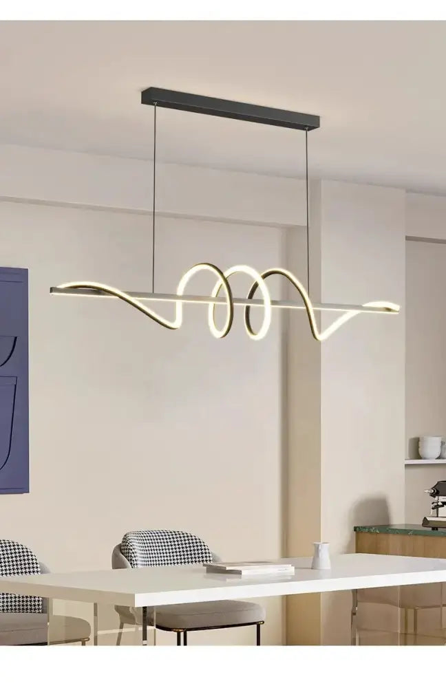 Sleek wavy pendant lights for dining room with brushed metallic finish